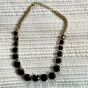 Black stone necklace.